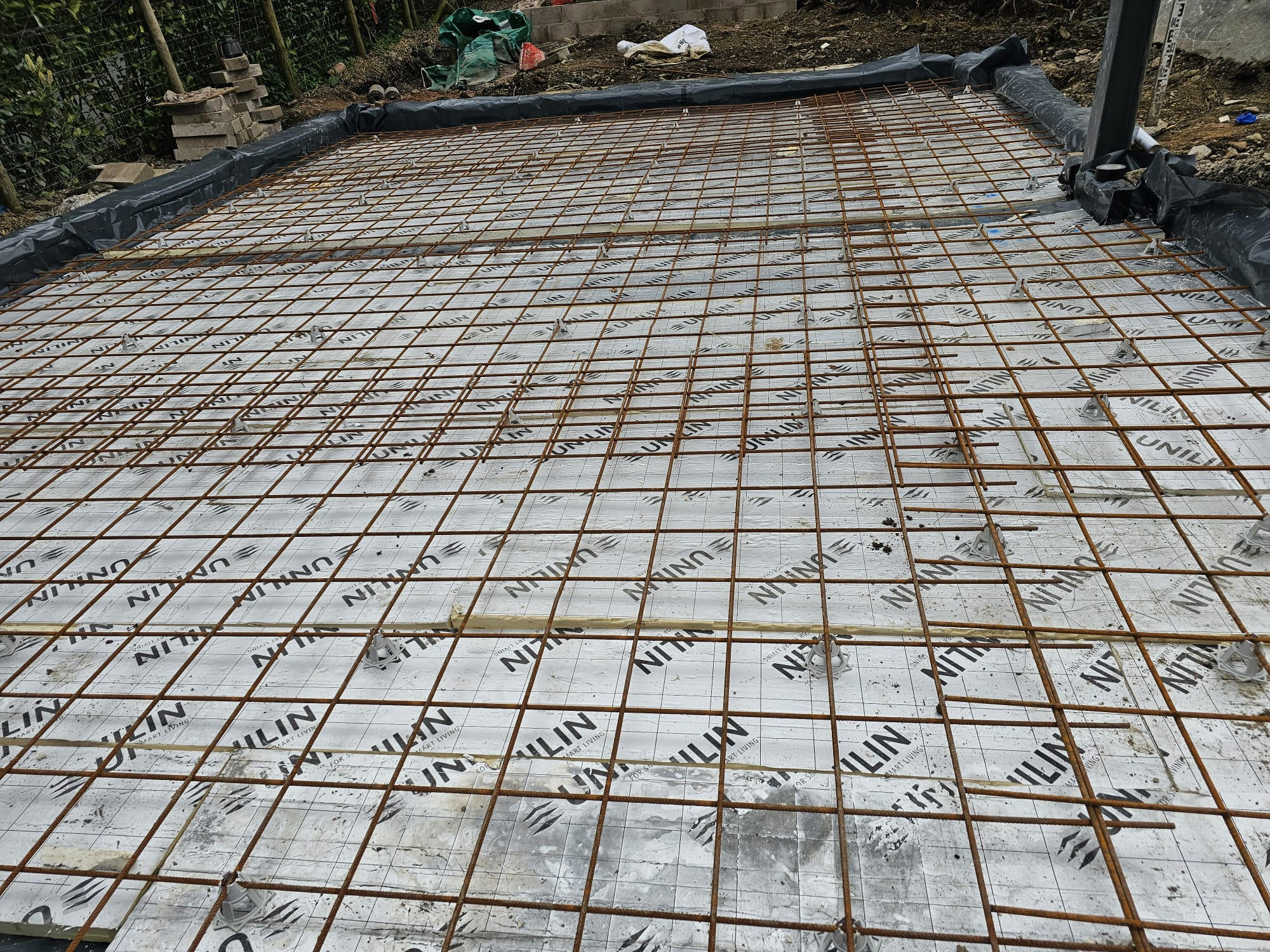 Insulated slab with rebar mesh ready for concrete pour