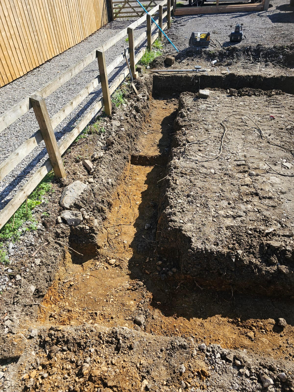 Excavated strip footing and oversite for a garden room build