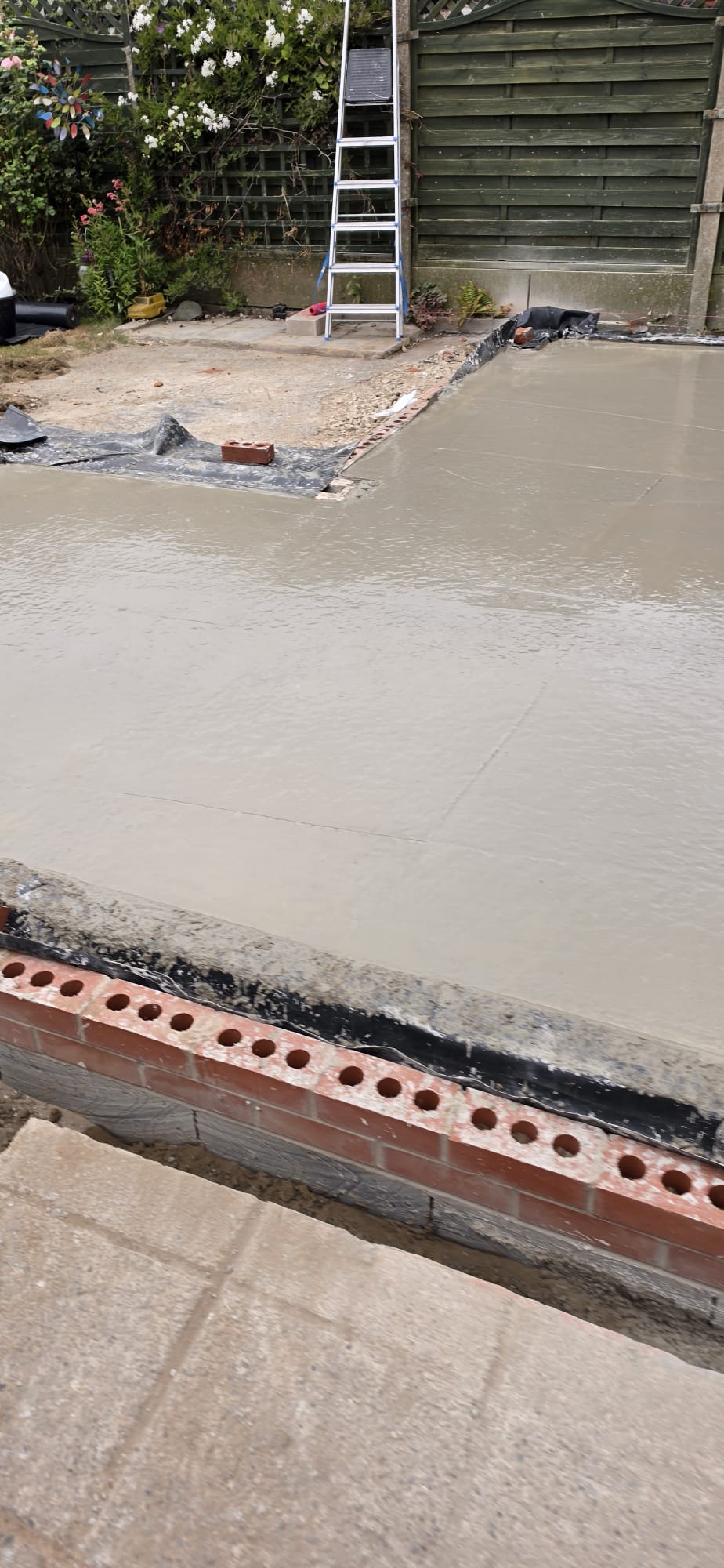 Finished concrete slab in a rear garden by DSG Groundworks, Blackpool